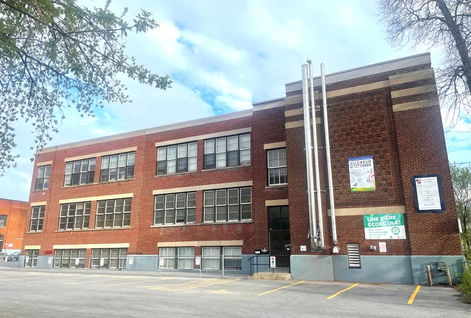 The brick facade of École élémentaire catholique Au Cœur d'Ottawa on Main Street.